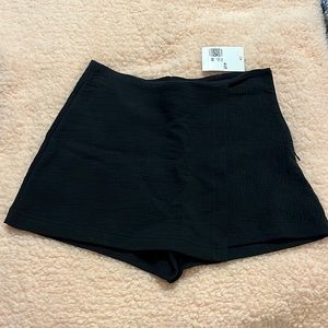 Black wrap front skort